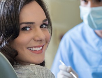 Woman smiling at the dentist