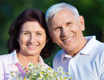 Smiling senior couple outdoors