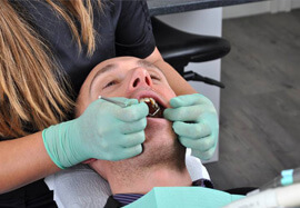 Man receiving dental treatment