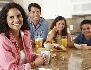 Smiling family in Michael K. Bassiri's Gainesville dental office